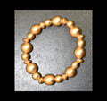 Wooden gold tone bracelet